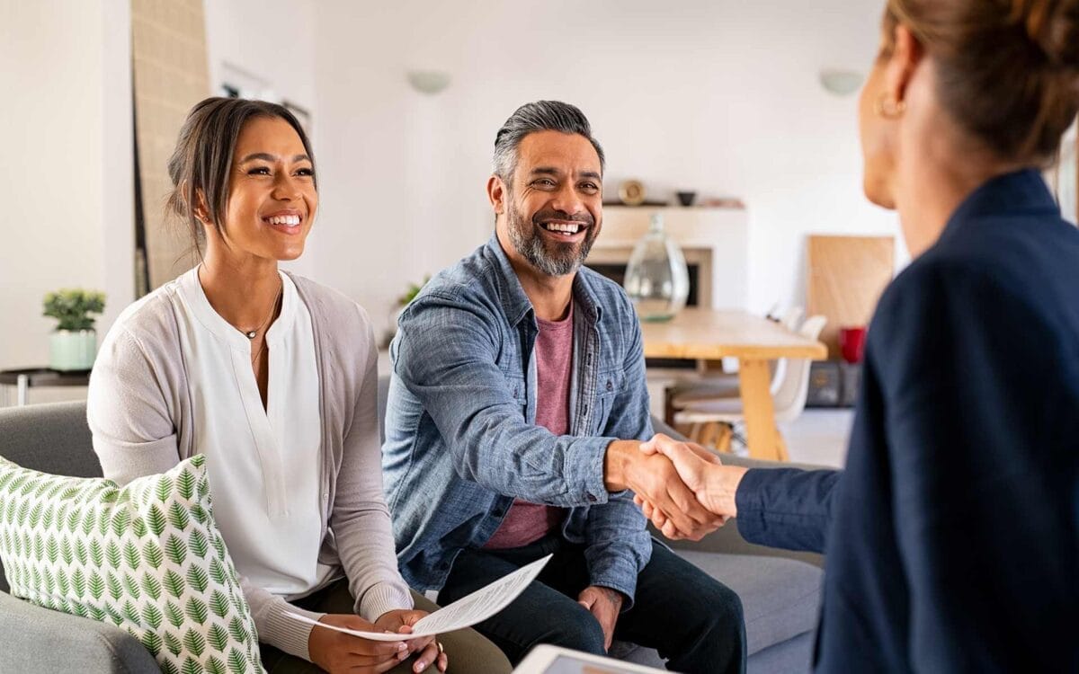 Male and Female couple in a meeting with a financial advisor